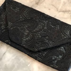 Jessica Simpson large black lace clutch